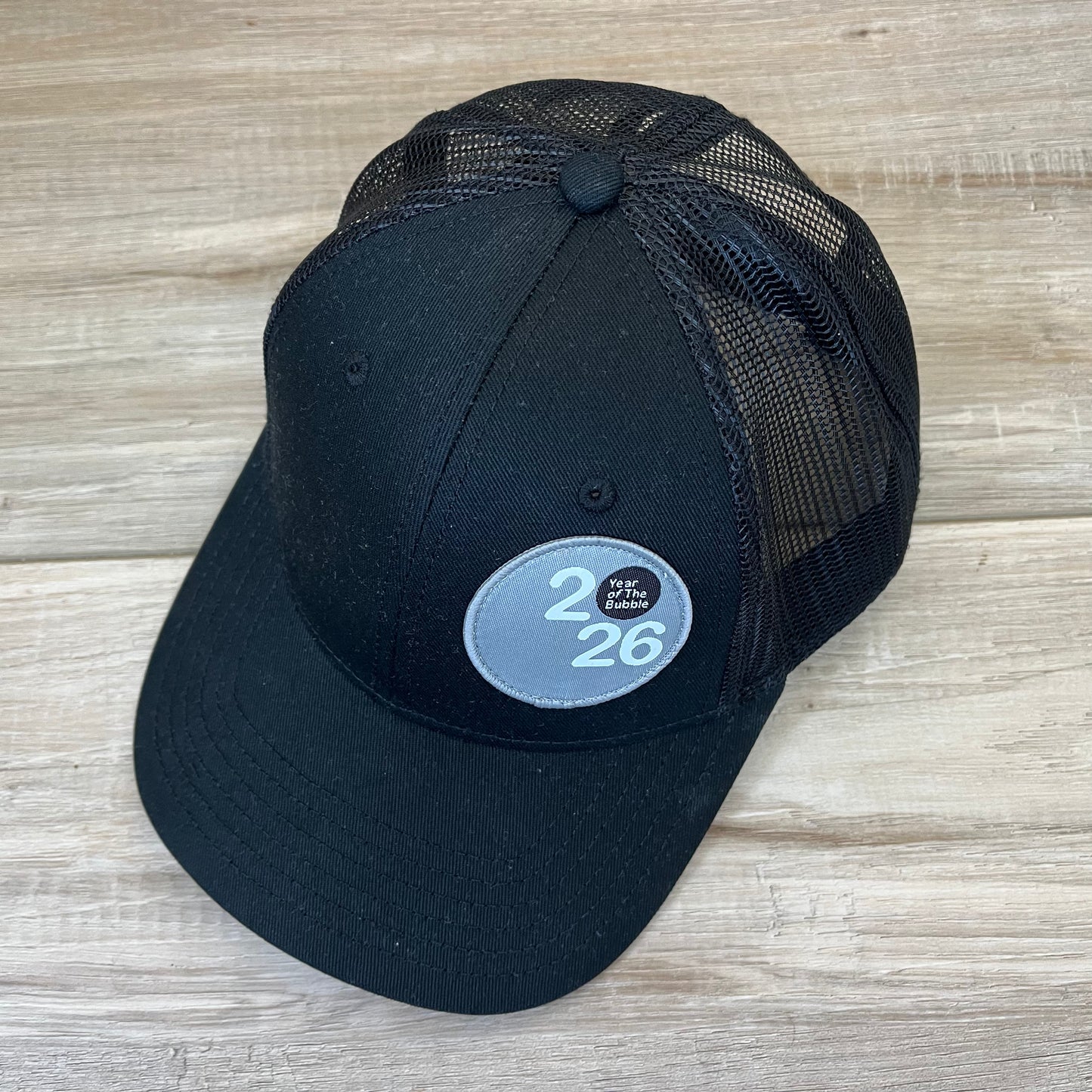 Trucker Cap (Black with Silver Badge).