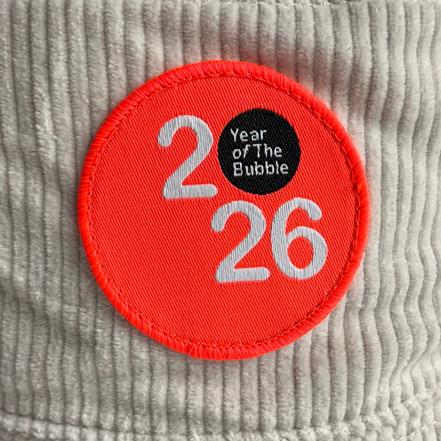 Cord Bucket Hat (Bone with Fluro Orange Badge).