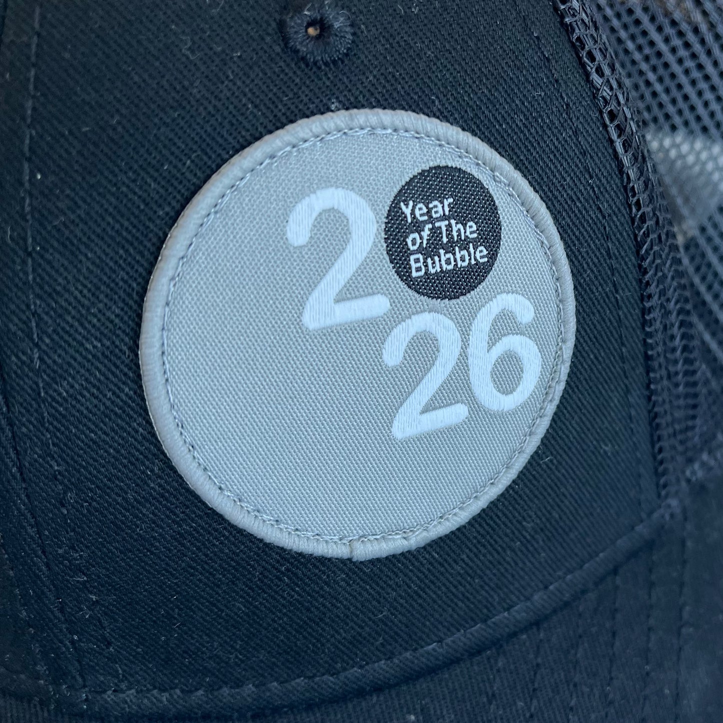 Trucker Cap (Black with Silver Badge).